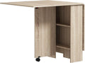 Grande table à manger pliante de 140 cm dépliée dans un séjour