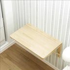 Grande table pliante murale en bois dépliée le long d'un mur - photo 2