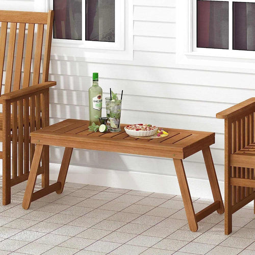 Petite table basse pliante en bois de meranti huilé devant un canapé d'extérieur - photo 2