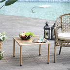 Petite table de jardin en bois pliante sur une terrasse - photo 2