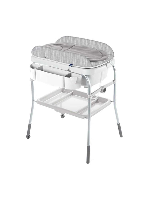 Table à langer avec baignoire pliante intégrée dans une salle de bain