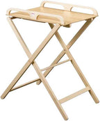 Table à langer pliante en bois de hêtre massif dans une chambre d'enfant