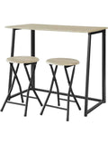 Table à manger pliante avec deux tabourets assortis dans un studio