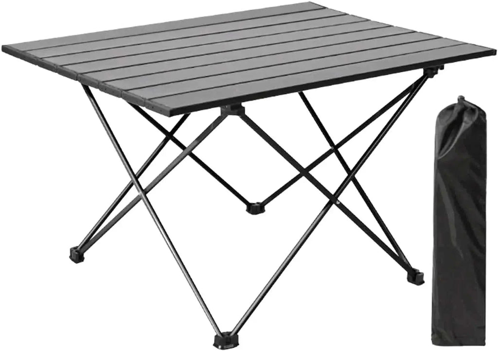 Table basse pliante de camping en aluminium 40 x 40 cm devant une tente