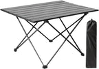 Table basse pliante de camping en aluminium 40 x 40 cm devant une tente