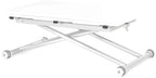 Table basse pliante relevable en position haute avec plateau étendu dans un salon