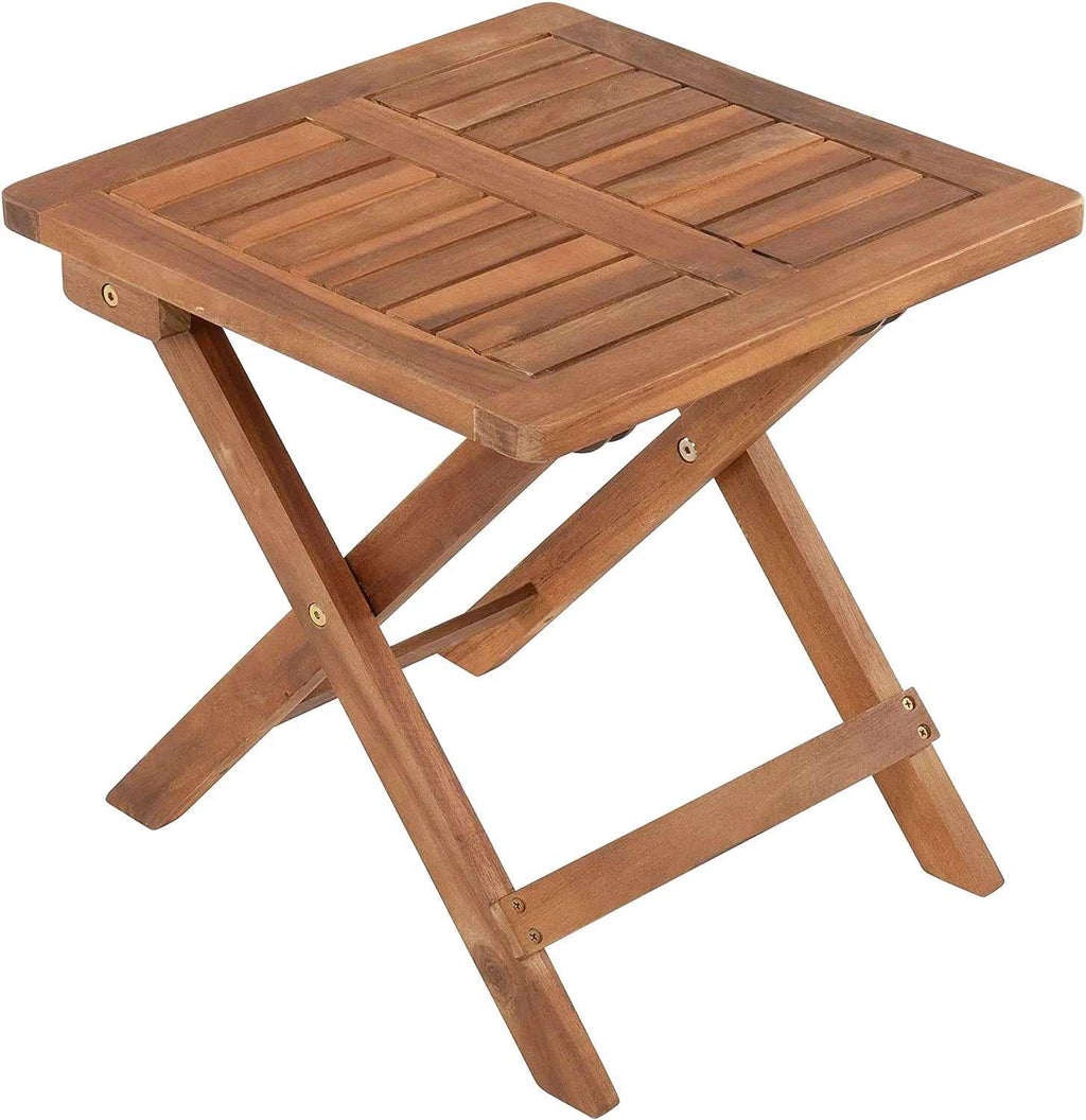 Table de jardin bois pliante en acacia massif 40 x 40 cm à côté d'un transat