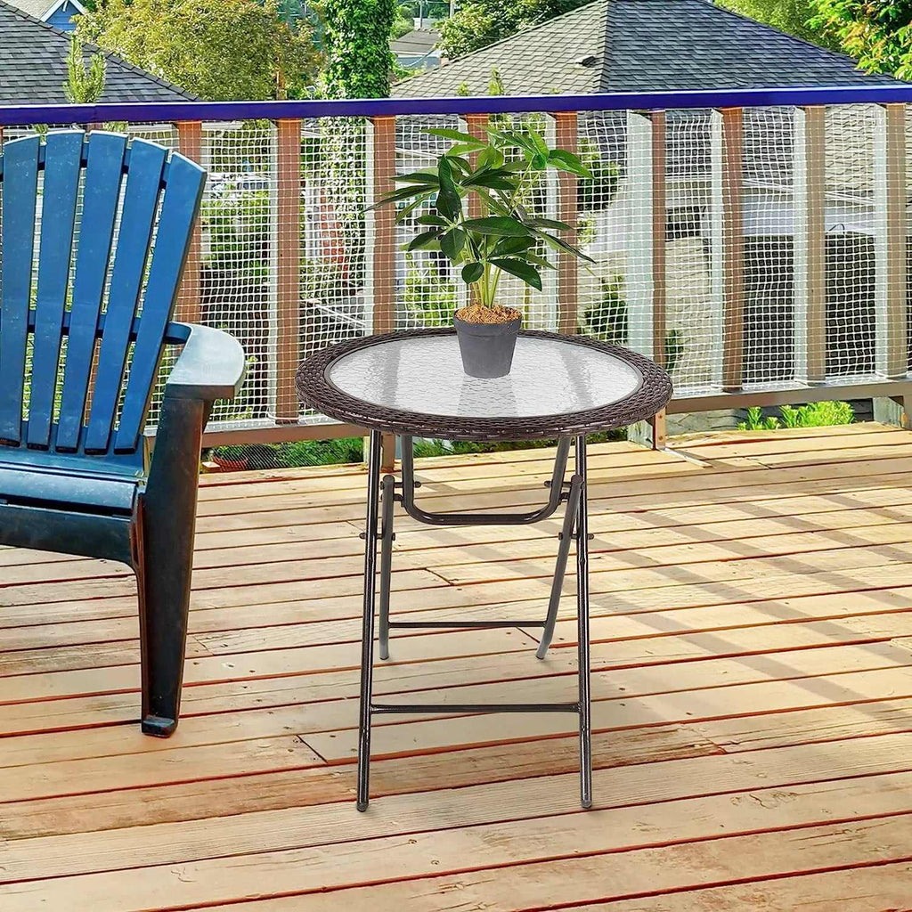 Table de jardin en verre pliante de 68 cm de diamètre sur une terrasse - photo 2