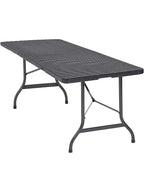 Table de jardin pliante 4 personnes en plastique aspect polyrotin sur une terrasse