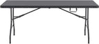 Table de jardin pliante 8 personnes en PEHD 183 x 76 cm installée dans un jardin