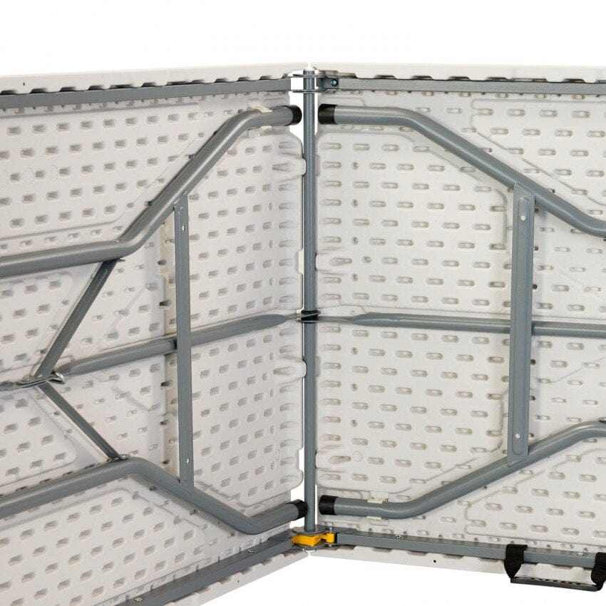 Table de jardin pliante en plastique blanche 180 x 70 cm dépliée dans un jardin - photo 2