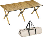 Table picnic pliante 6 personnes en aluminium de 116 cm sur une pelouse