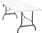 Table pliante de 2 mètres dressée pour un grand repas de famille