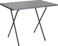 Table pliante de balcon en métal de 80 x 50 cm contre un mur