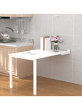 Table pliante murale de cuisine dépliée le long d'un mur